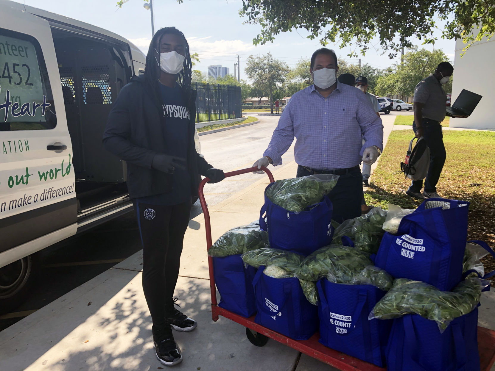 Johnathan Cyprien and Mayor DeFelipo